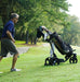 Golf&More Tourer Elektrische Golftrolley zwart voor man tijdend op de fairway