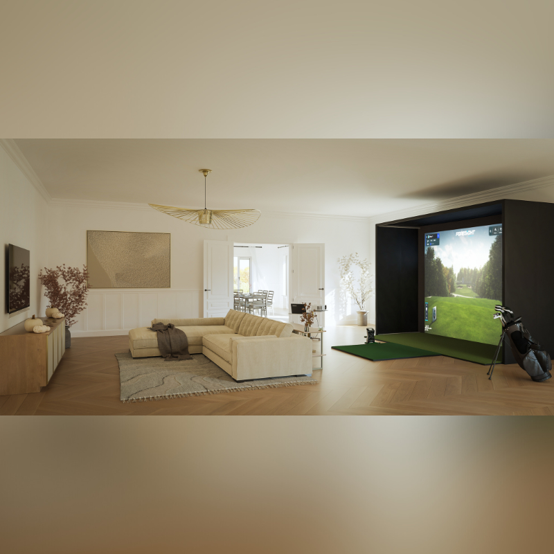 Golf Simulator gehele set-up van Foresightsports met een GC Quad in de woonkamer achter een bank. 
