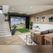 Indoor Golfsimulatie gehele set-up van Foresightsports met een GC3 in de woonkamer naast de trap